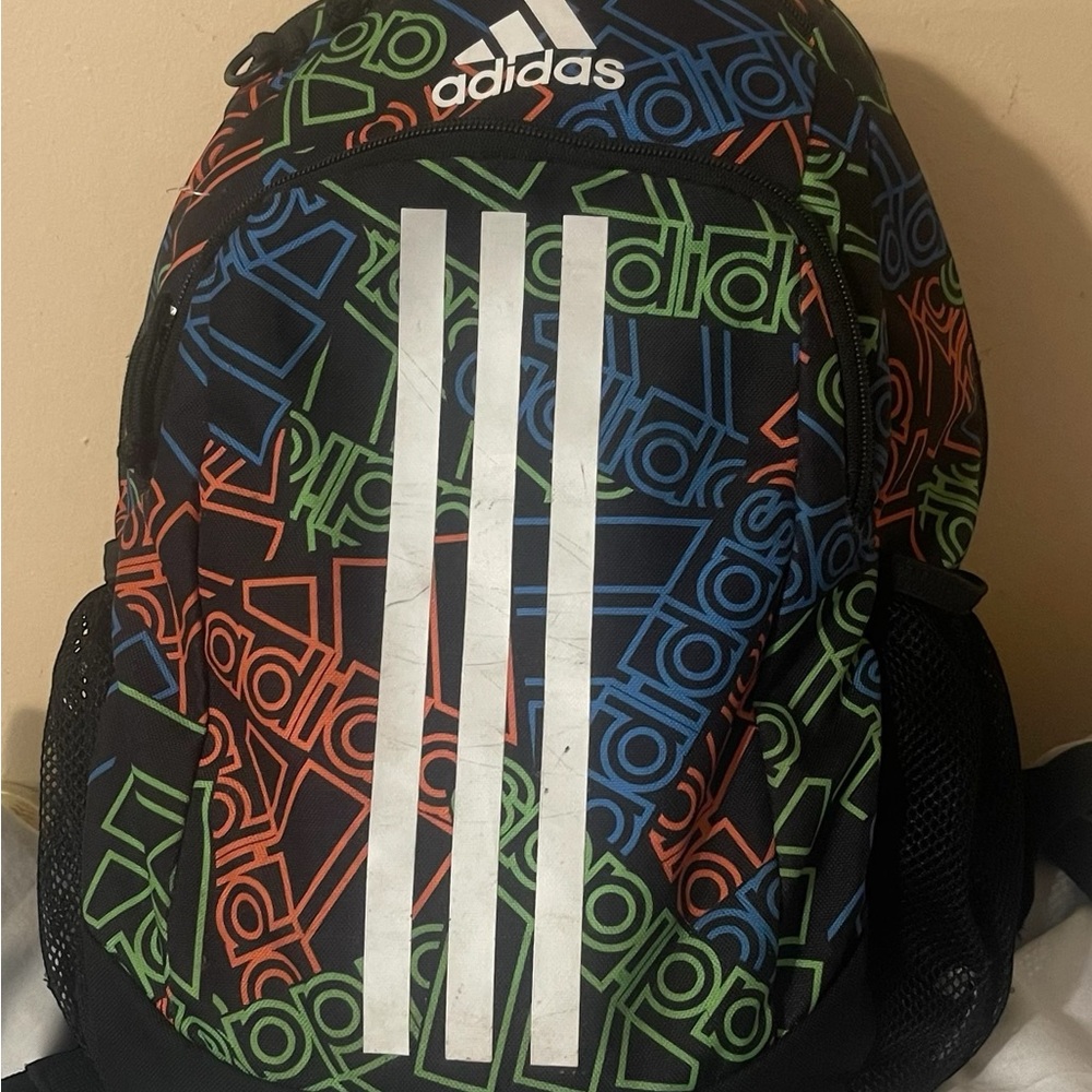Adidas Black Backpack with Multicolor Logo Design 28" long 14" wide. UNISEX